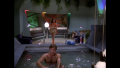William "Buck" Rogers lounges in a large bath while visited by Ryma, a Vistulan nomad (BR25: "Planet of the Slave Girls").