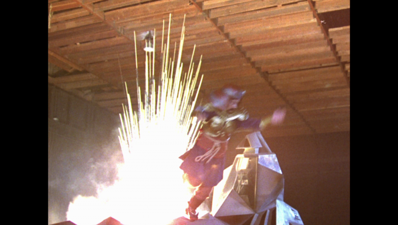 File:BR25 - Awakening - Pyrotechnics, Stunts, and Wood Framed Ceilings of Draconia's Launch Bay.png