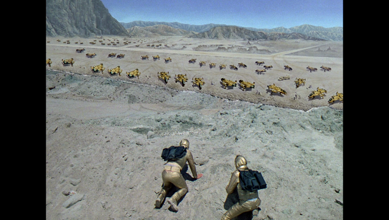 File:BR25 - Planet of the Slave Girls - Danton and Rogers Happen Across Kaleel's Scorpion Fighters.png