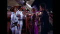 The Third Force of the Earth Directorate's Col. Wilma Deering and William "Buck" Rogers met by Princess Ardala and Kane (BR25: Film, "Awakening"). Note the helmet held by Rogers is a "shell" featuring no interior lining, typically used for scenes where the helmet is not being worn by a character.
