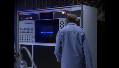 Dr. Mallory approaches Carl (BR25: "Planet of the Slave Girls").