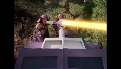 Draconian soldiers operating the turret of their landcraft while pursuing William "Buck" Rogers in Anarchia, outside of New Chicago (BR25: "Escape from Wedded Bliss").