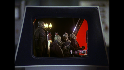 William "Buck" Rogers is shown a recording of a Saurian delegation in talks with representatives of Earth (BR25: "Mark of the Saurian").
