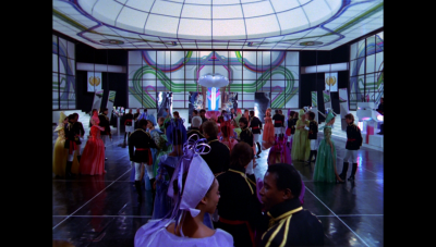 The reception hall in the Palace of Mirrors where the Draconian trade delegation receives its reception by the Earth Directorate (BR25: Film, "Awakening").