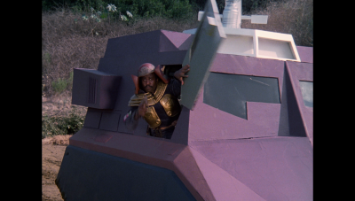 A Draconian soldier pops out from the right side hatch of their landcraft (BR25: "Escape from Wedded Bliss").