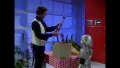 William "Buck" Rogers looks over a giant pepper mill made by Twiki over his 20th century dining table set (BR25: "Awakening").