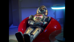 BR25 - Awakening - Twiki and Theo in a Bean Chair.png